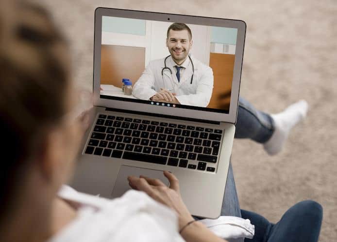 video call via laptop with doctor